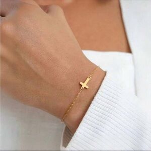 Gold cross bracelet